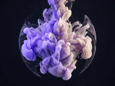 A violet ink plume held in a symmetrical bubble that stops at an invisible boundary